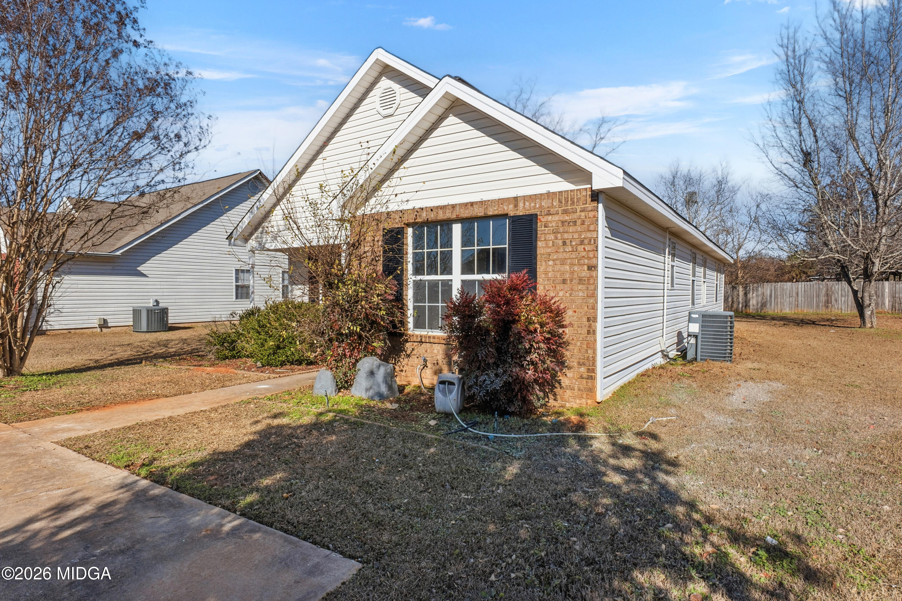 404 Wynfield Lane Bonaire, GA 31005 - Photo 44 of 45 a view of a house with backyard and trees