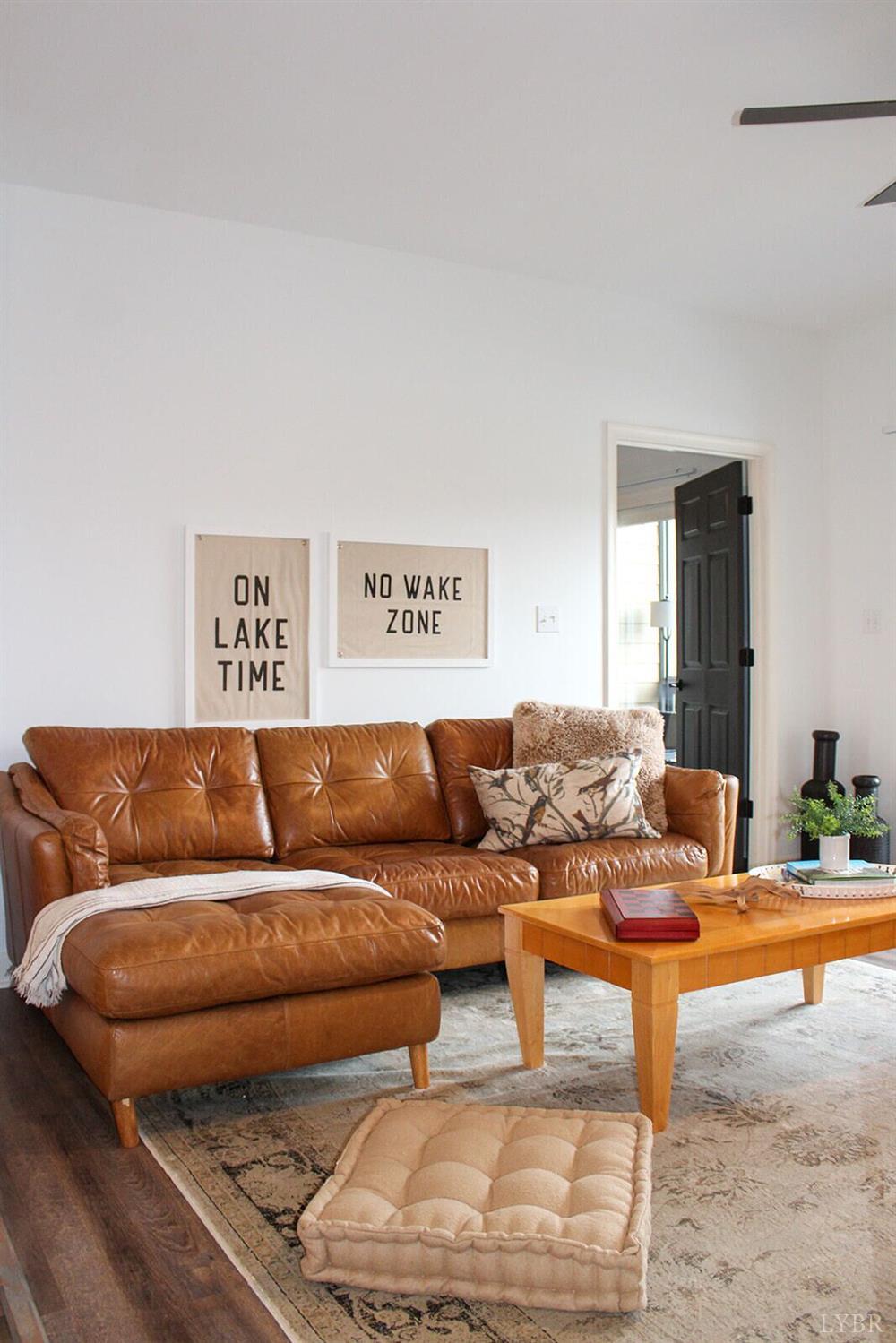 1019 Mariners Way, Unit 30 Huddleston, VA 24104 - Photo 14 of 48 a living room with furniture and a rug