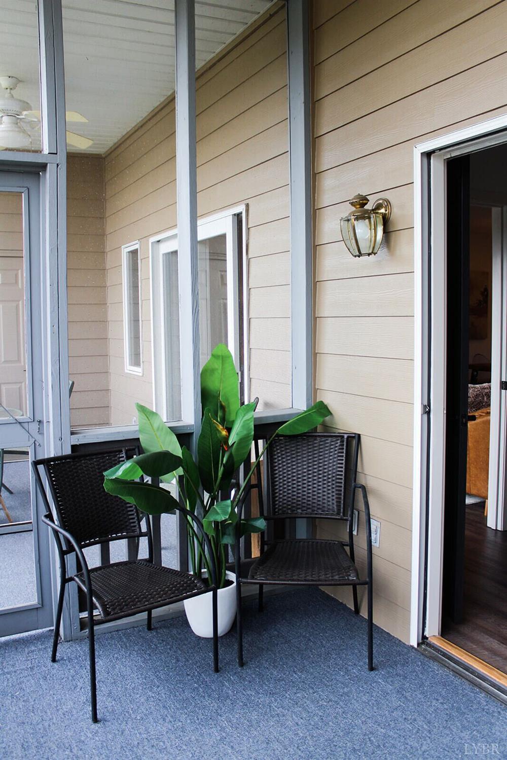 1019 Mariners Way, Unit 30 Huddleston, VA 24104 - Photo 30 of 48 a view of a house with a furniture and a potted plant