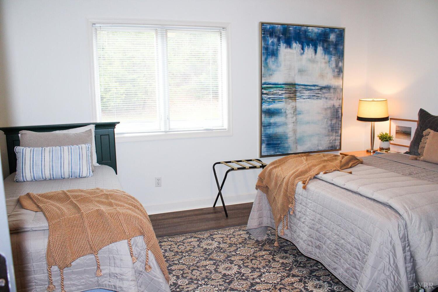 1019 Mariners Way, Unit 30 Huddleston, VA 24104 - Photo 33 of 48 a bedroom with a bed and a window