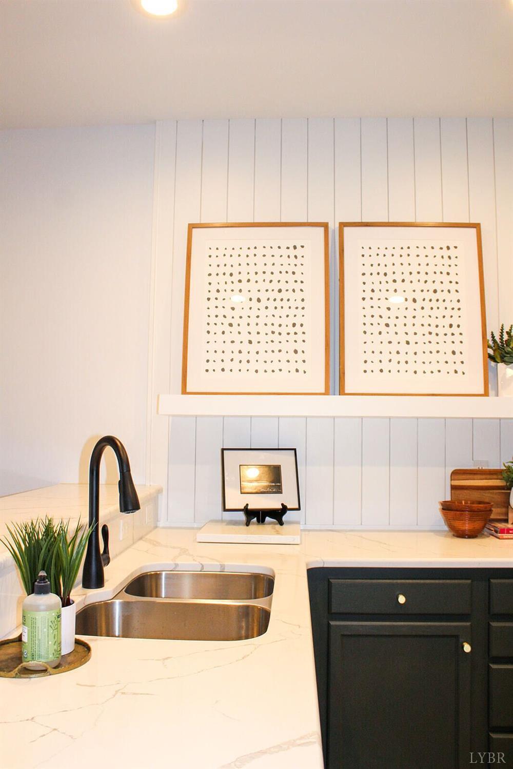 1019 Mariners Way, Unit 30 Huddleston, VA 24104 - Photo 6 of 48 a kitchen with a sink and a window
