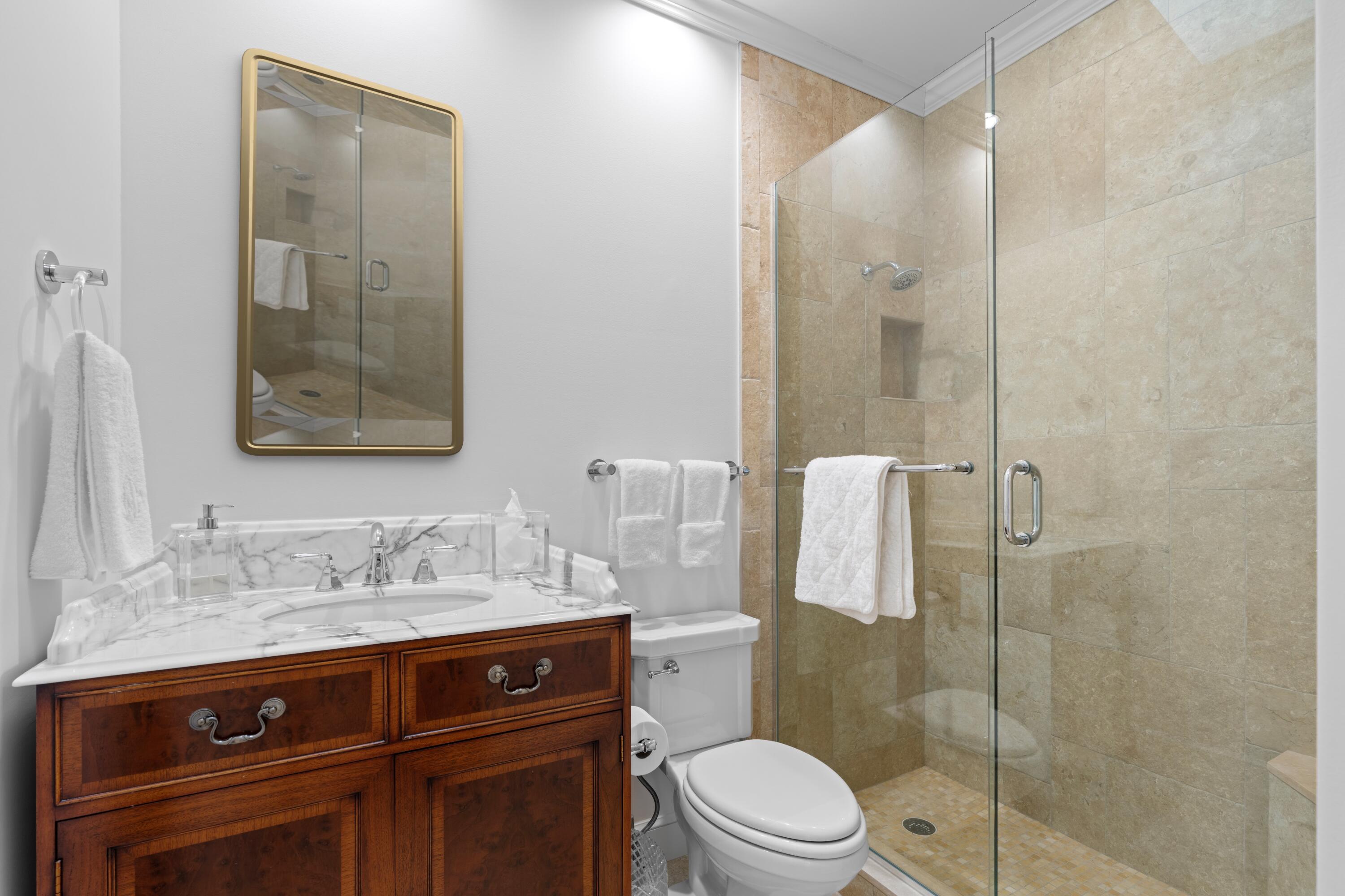 123 Terrapin Trail Jupiter, FL 33458 - Photo 17 of 63 a bathroom with a sink a toilet and shower