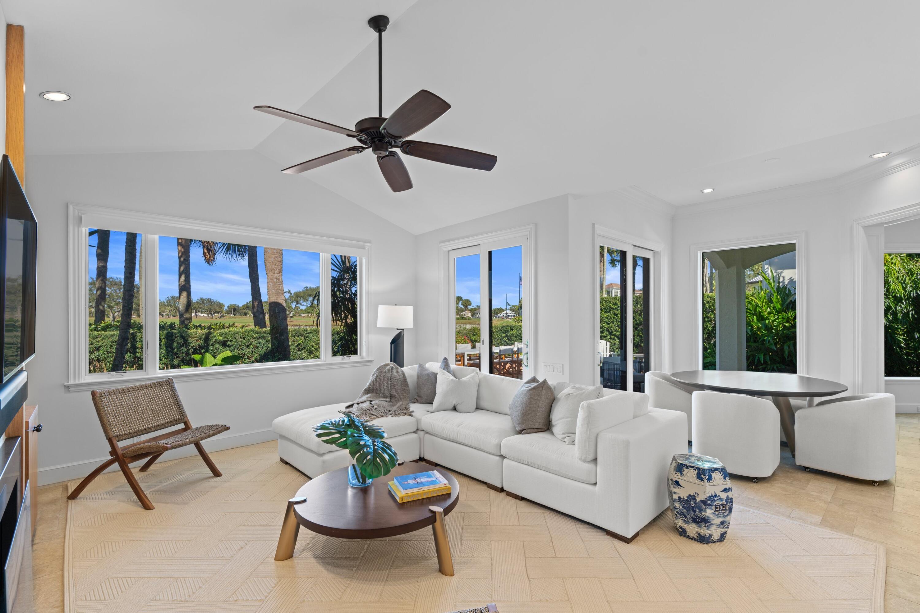 123 Terrapin Trail Jupiter, FL 33458 - Photo 4 of 63 a living room with furniture and a large window