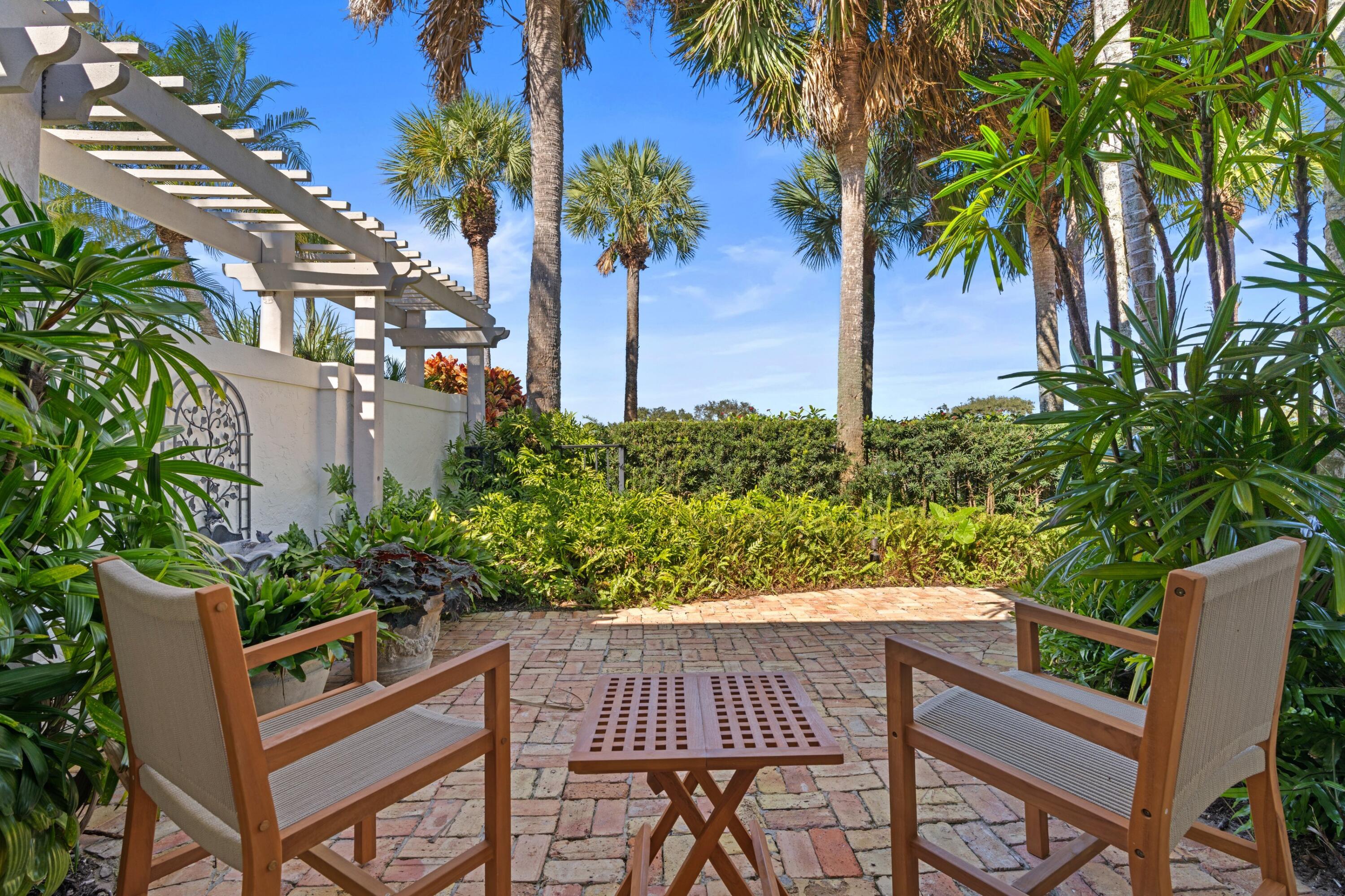 123 Terrapin Trail Jupiter, FL 33458 - Photo 43 of 63 a view of an outdoor sitting area with furniture