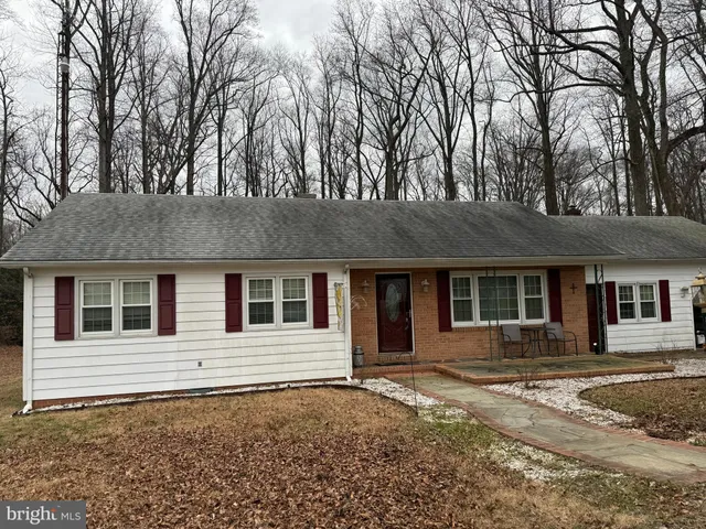 a house with trees in front of it