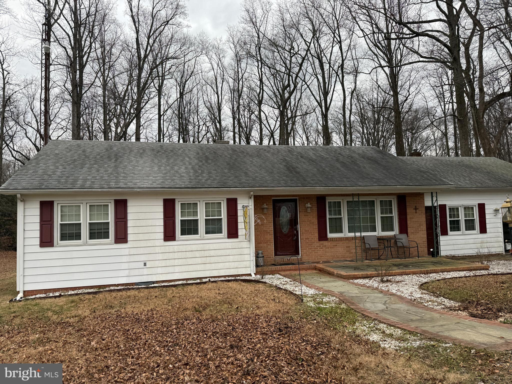 11305 River Road Ridgely, MD 21660 - Photo 2 of 14 a house with trees in front of it