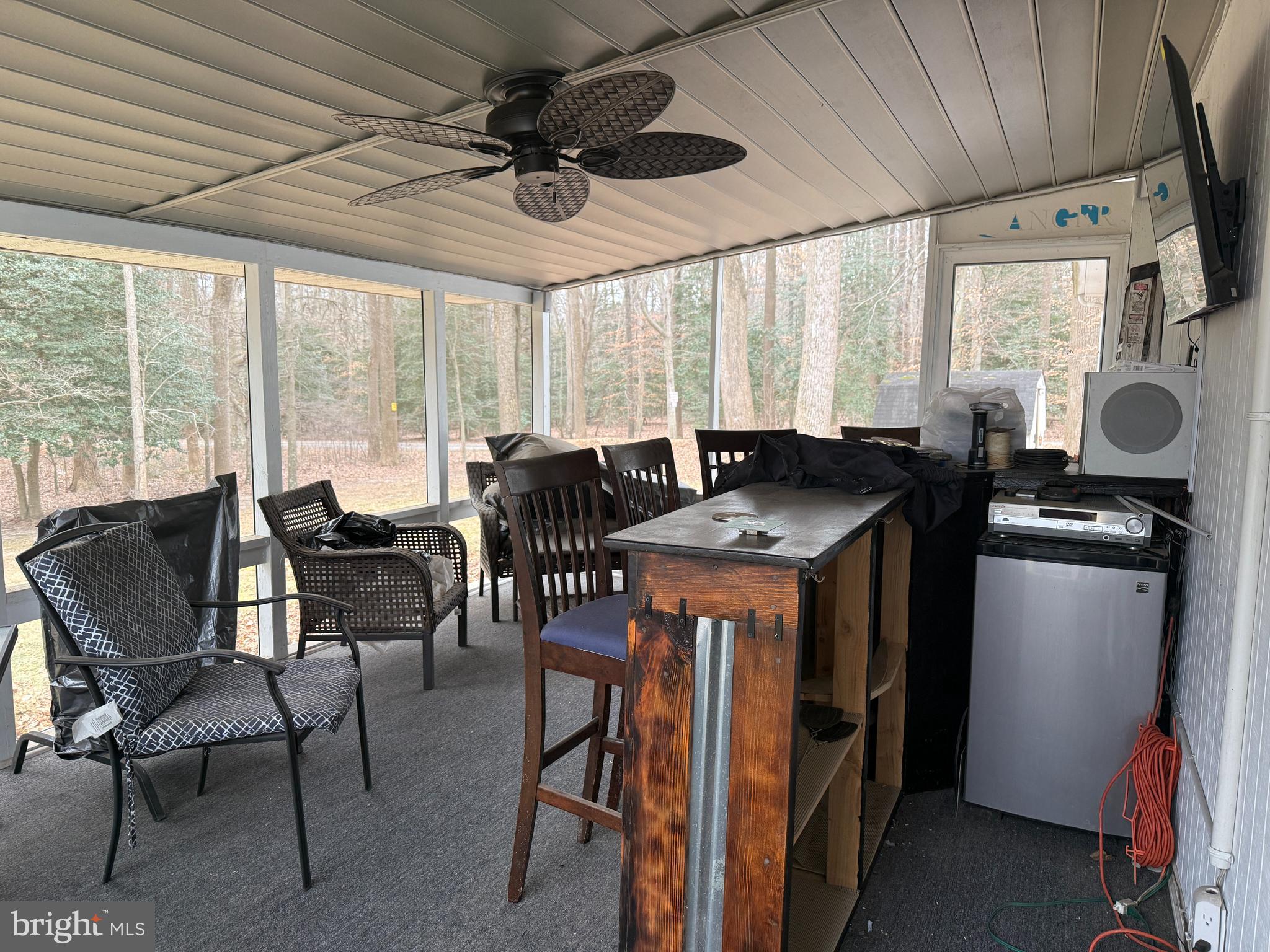 11305 River Road Ridgely, MD 21660 - Photo 7 of 14 a view of a dining room with furniture window and outside view