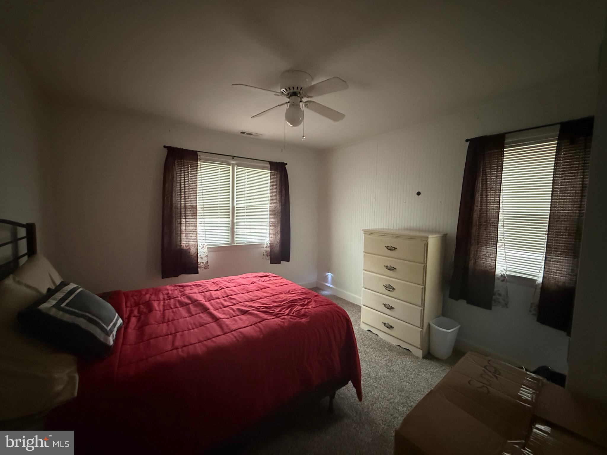 11305 River Road Ridgely, MD 21660 - Photo 10 of 14 a bedroom with a bed and a window