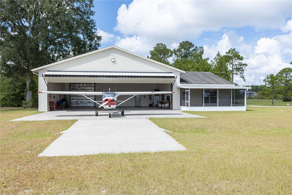 168 Southwest Poberezny Glen Lake Lake City, FL 32025 - Photo 1 of 29 a view of house with swimming pool outdoor seating