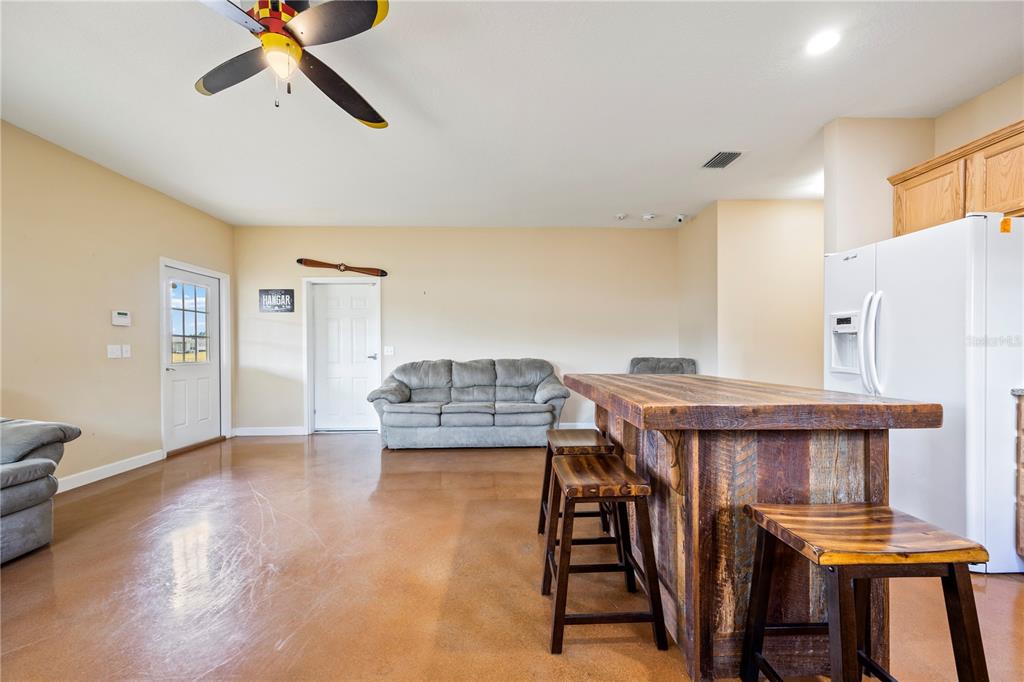 168 Southwest Poberezny Glen Lake Lake City, FL 32025 - Photo 15 of 29 a view of a livingroom with furniture and staircase