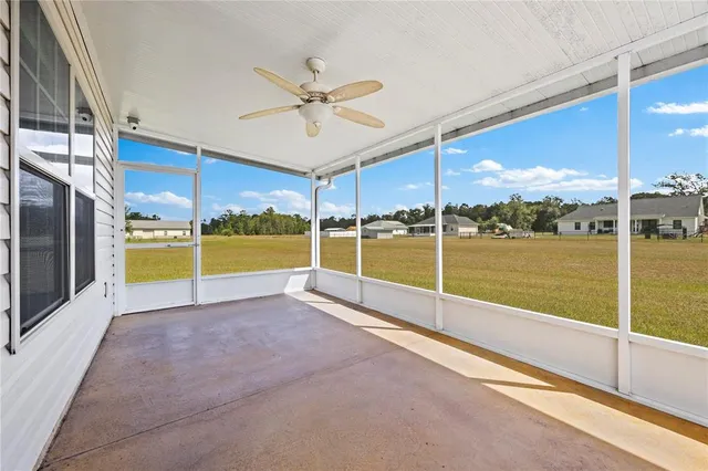a view of a water heater room with a big yard