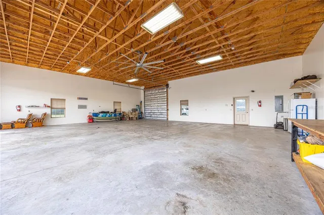 a view of parking garage with furniture