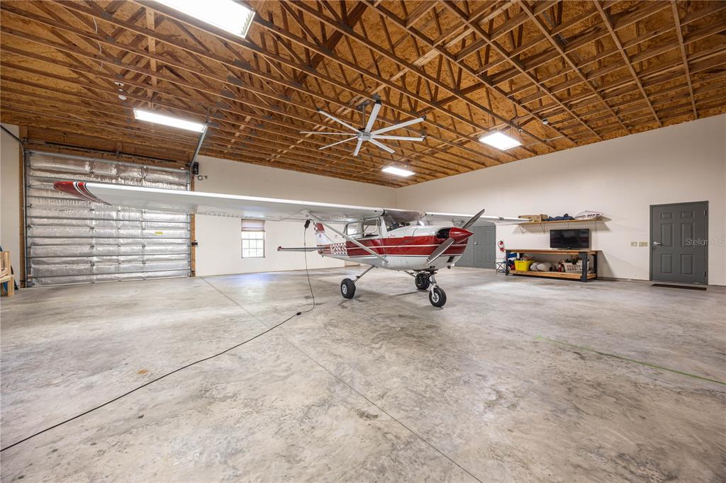 168 Southwest Poberezny Glen Lake Lake City, FL 32025 - Photo 22 of 29 a view of parking garage with furniture