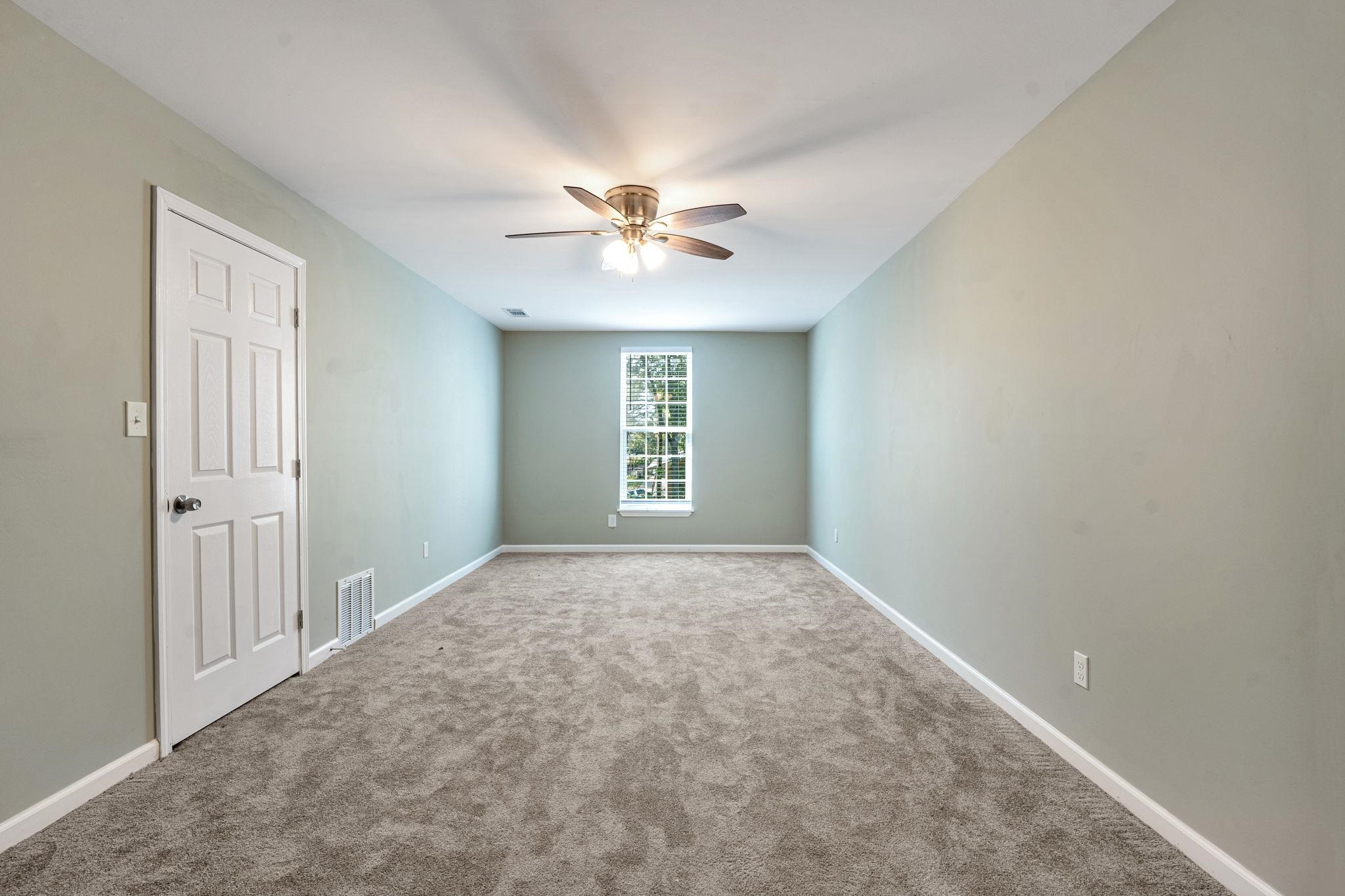 71 Clark Place Memphis, TN 38104 - Photo 6 of 11 a view of an empty room with a window