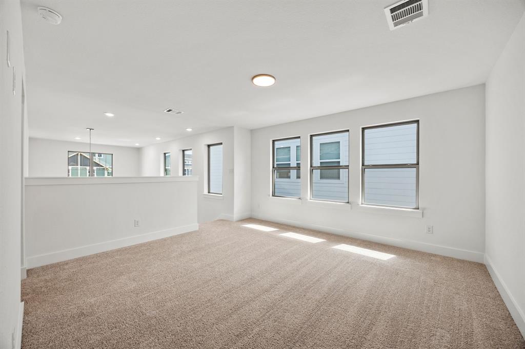 316 Chestnut Street Celina, TX 75009 - Photo 12 of 25 a view of an empty room with a window