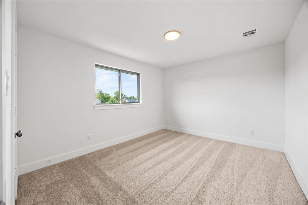 316 Chestnut Street Celina, TX 75009 - Photo 21 of 25 an empty room with windows