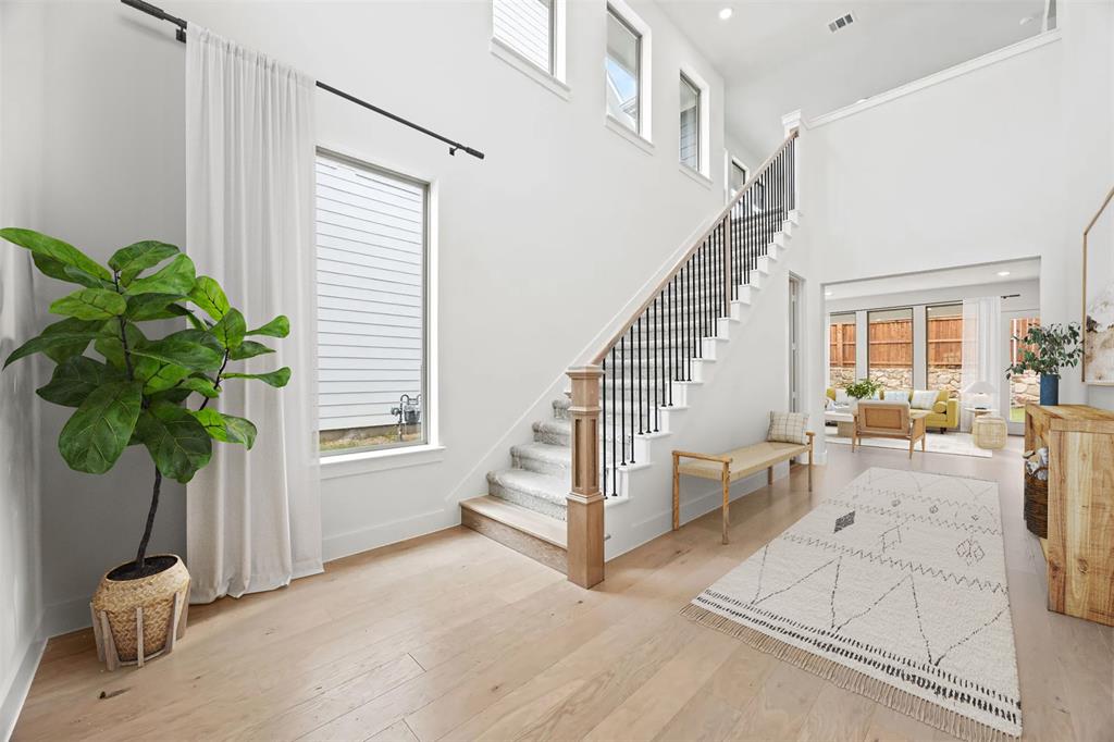 316 Chestnut Street Celina, TX 75009 - Photo 3 of 25 a living room with furniture and a potted plant