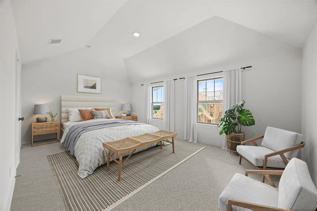 316 Chestnut Street Celina, TX 75009 - Photo 7 of 25 a spacious bedroom with a bed and a couch