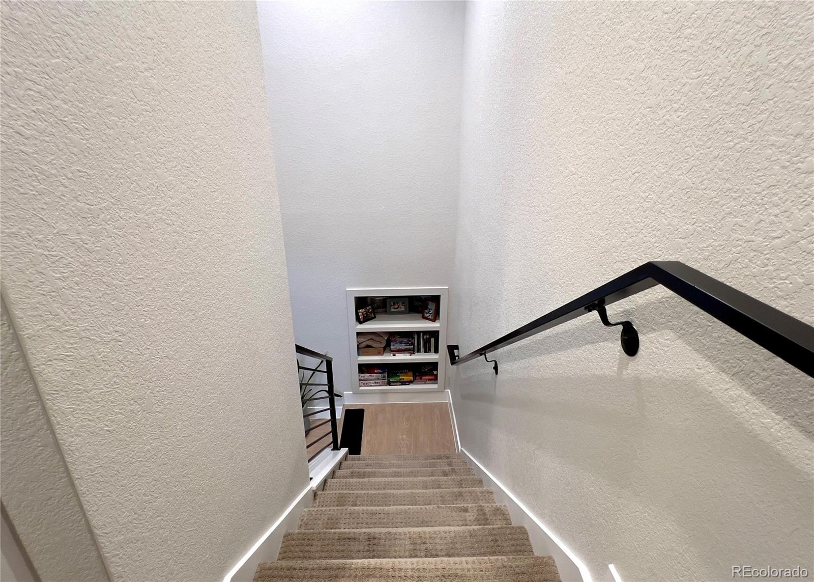 6228 West 38th Avenue Wheat Ridge, CO 80033 - Photo 16 of 38 a view of a hallway with stairs