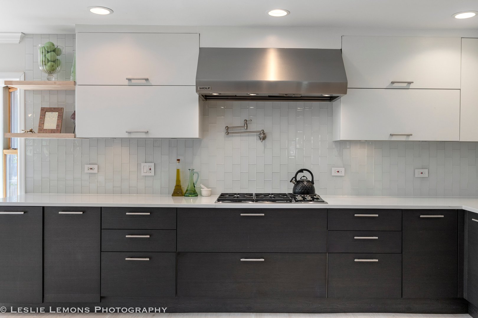 8S452 Bell Drive Naperville, IL 60565 - Photo 12 of 59 a kitchen with a sink a stove and cabinets