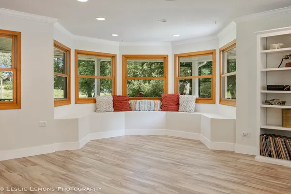 a large bedroom with a large bed and furniture