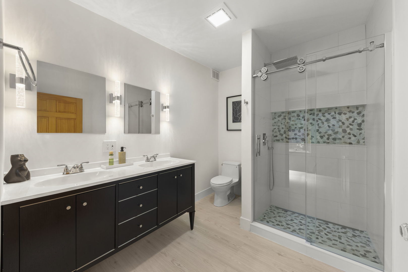 8S452 Bell Drive Naperville, IL 60565 - Photo 40 of 59 a bathroom with a double vanity sink toilet mirror and shower