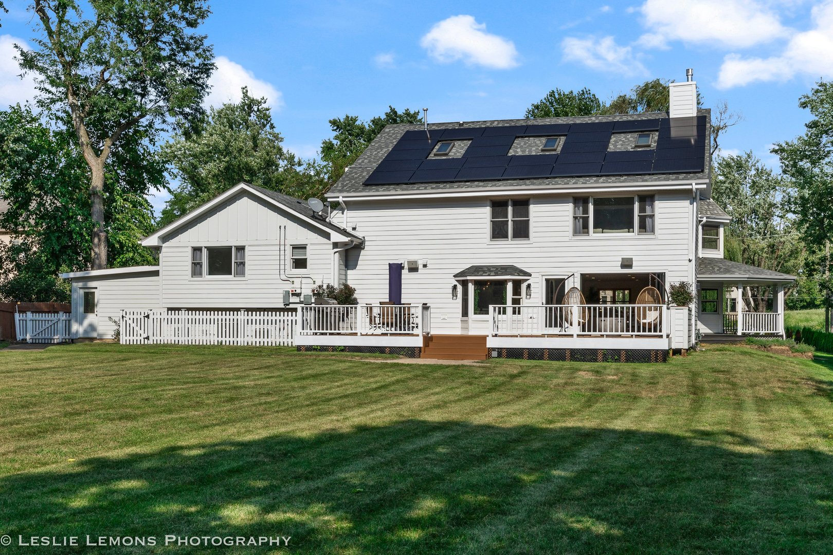 8S452 Bell Drive Naperville, IL 60565 - Photo 45 of 59 a front view of a house with a garden
