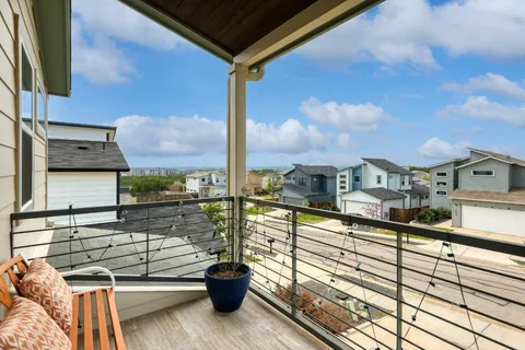 a view of a building from a balcony