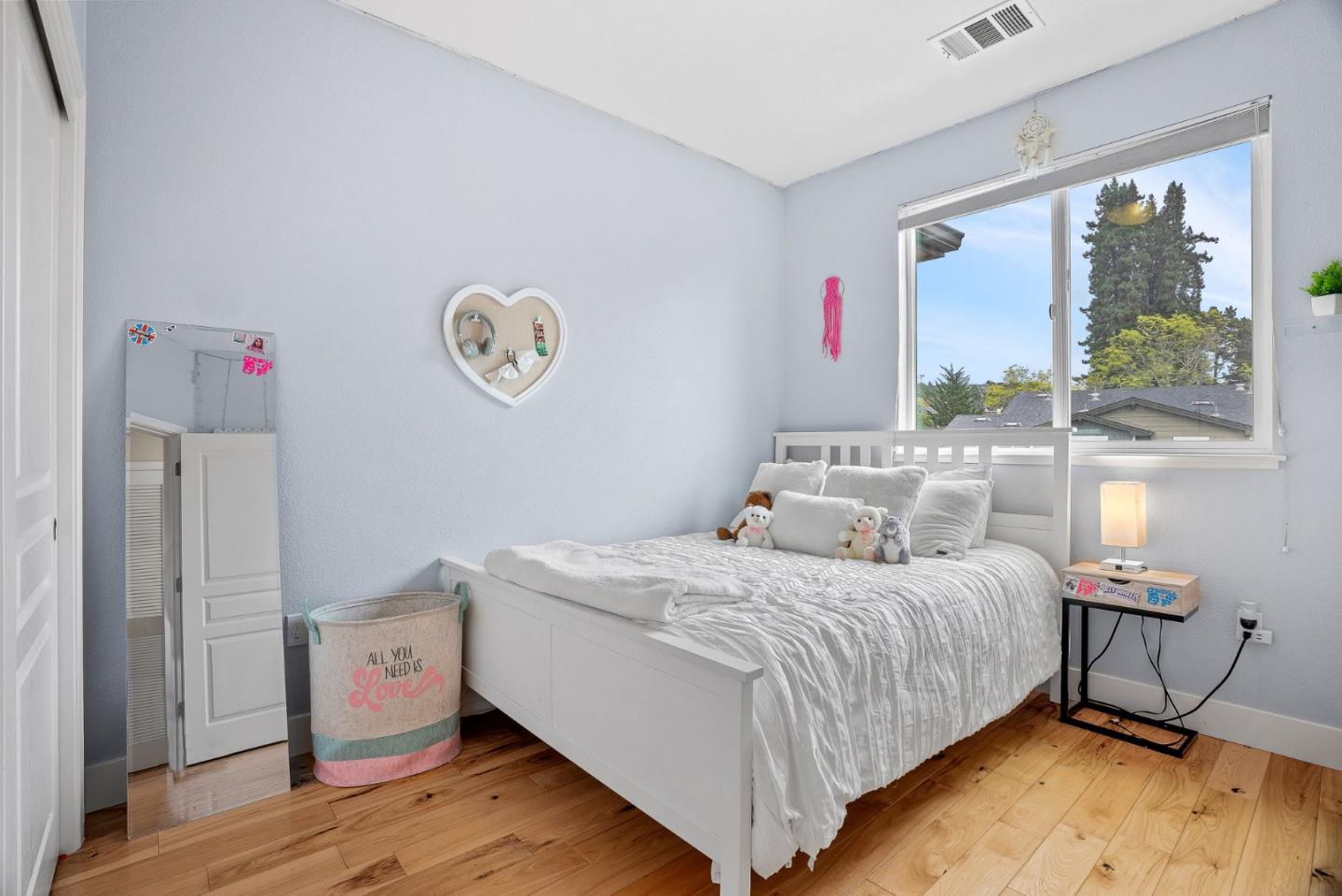 142 Atherton Loop Aptos, CA 95003 - Photo 14 of 21 a bedroom with a bed and a table