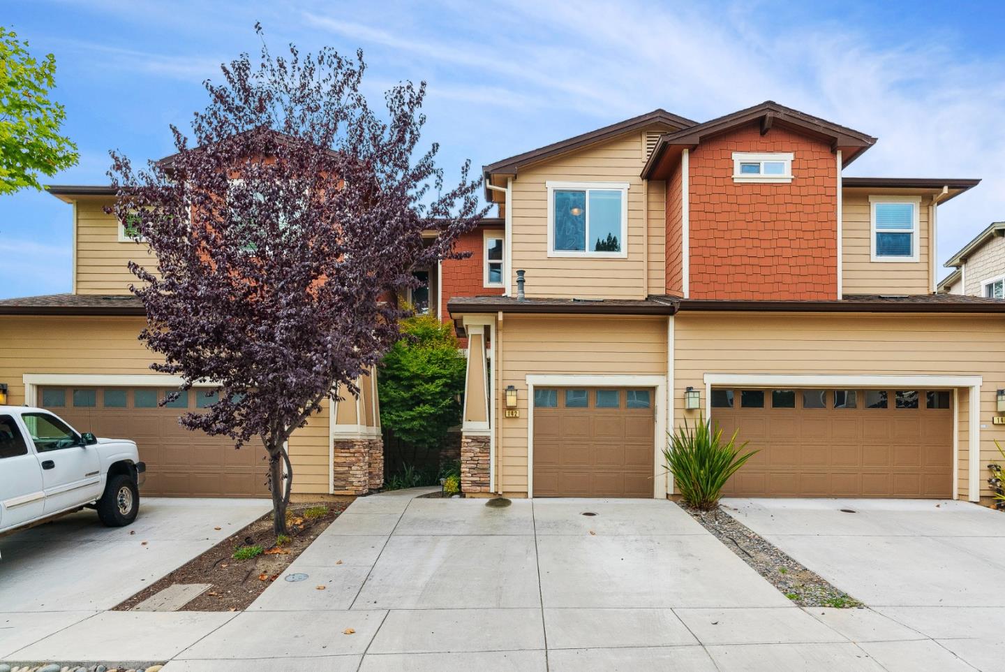 142 Atherton Loop Aptos, CA 95003 - Photo 17 of 21 a front view of a house with a yard and garage