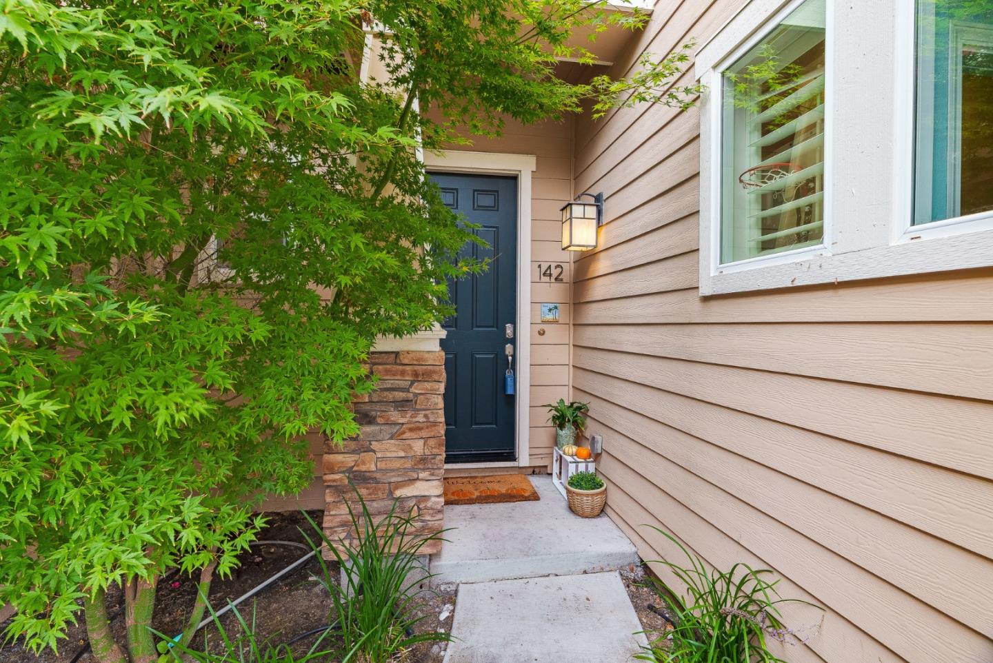142 Atherton Loop Aptos, CA 95003 - Photo 18 of 21 a backyard of a house with lots of green space