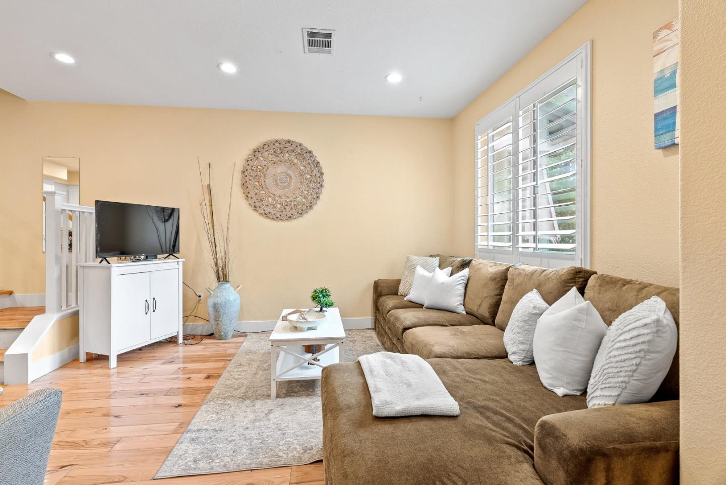 142 Atherton Loop Aptos, CA 95003 - Photo 3 of 21 a living room with furniture and a flat screen tv