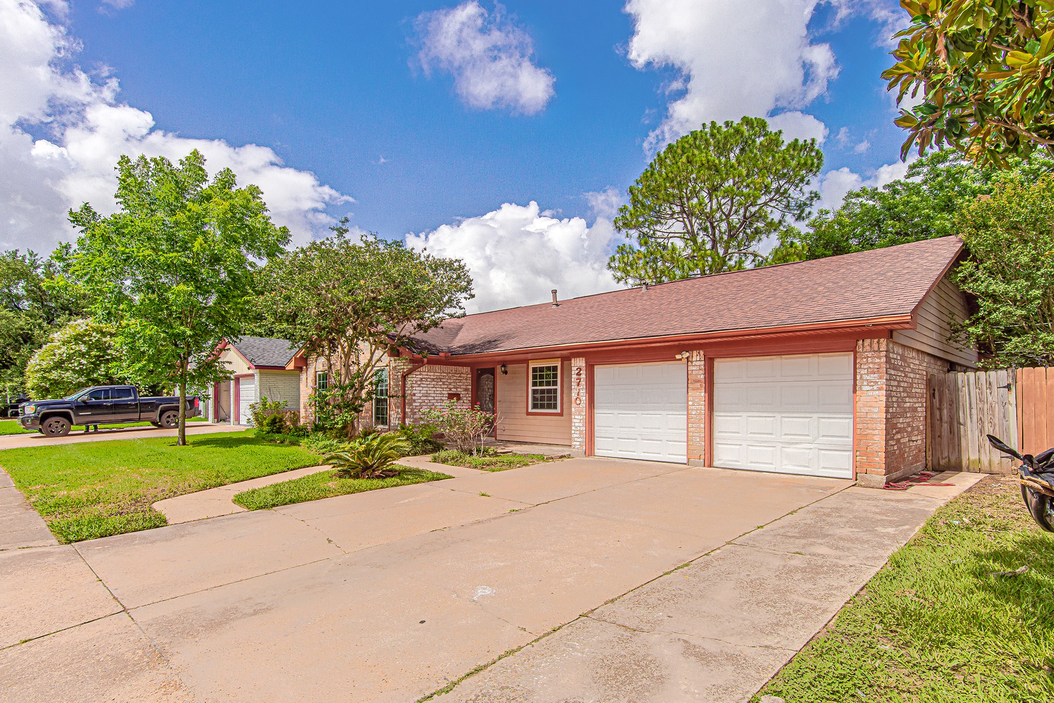 2710 Burke Road Pasadena, TX 77502 - Photo 2 of 28 Spacious driveway and attached two-car garage provide ample parking