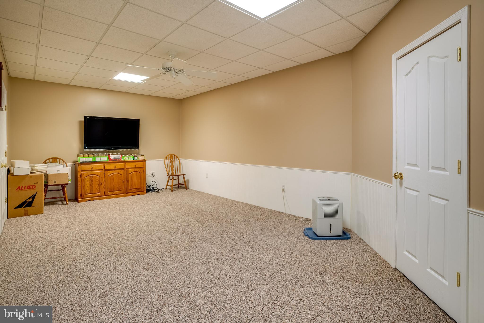 61 Starr Road Reading, PA 19608 - Photo 68 of 79 Finished Basement, the TV will stay