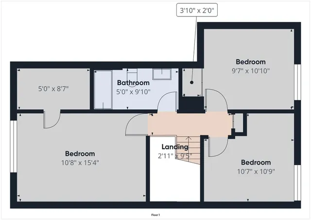 a picture of a bench in front of a wall