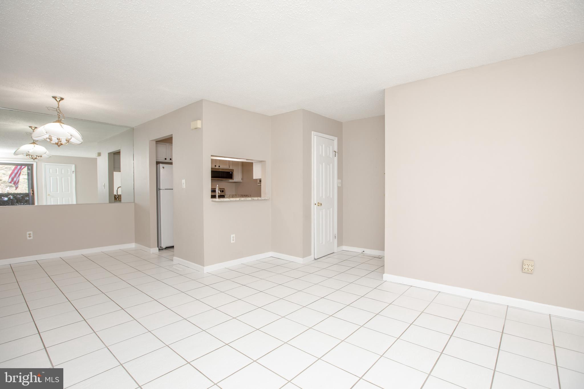 6 Bozarth Court Hamilton, NJ 08690 - Photo 3 of 21 a view of an empty room and window