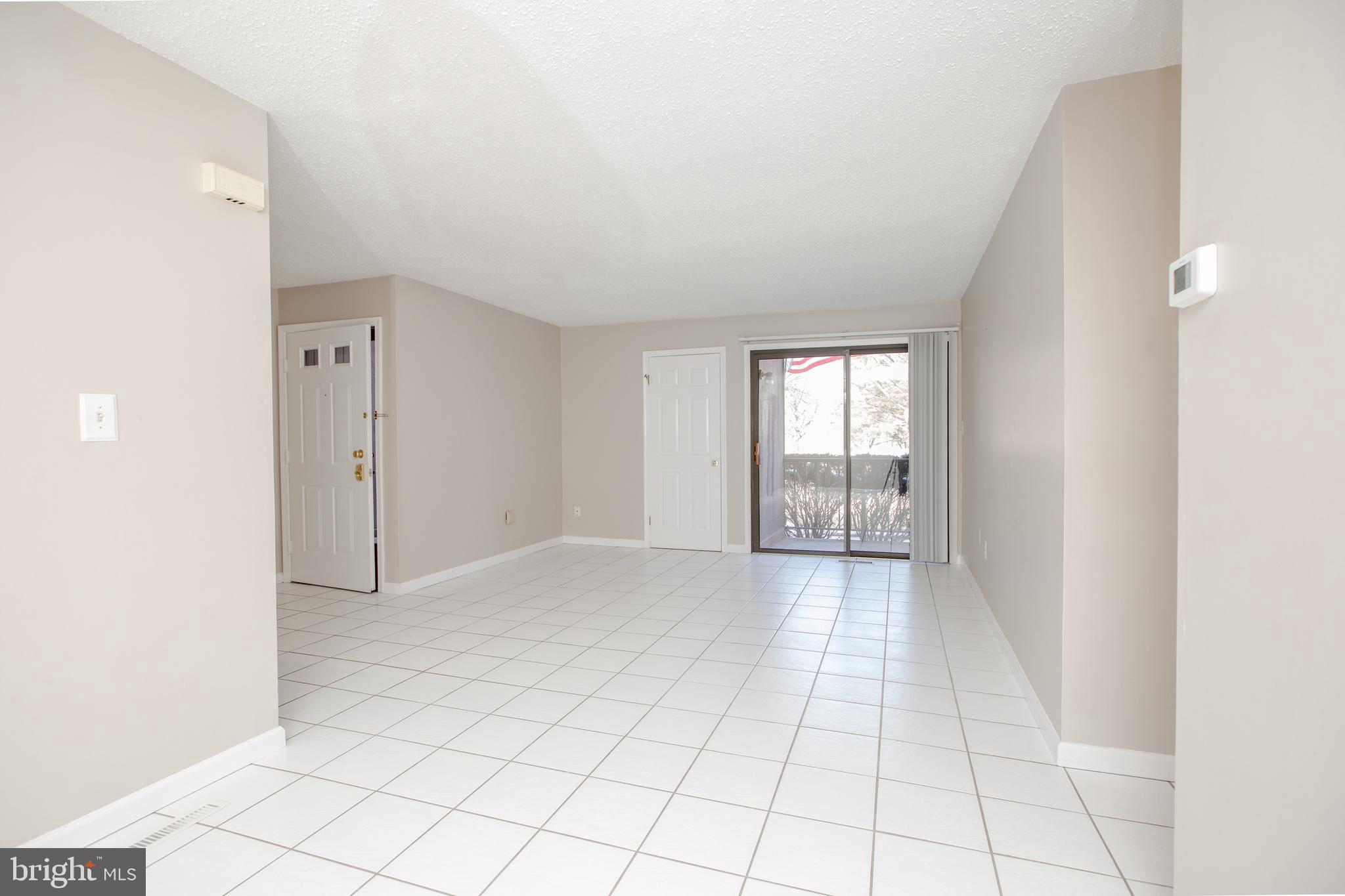 6 Bozarth Court Hamilton, NJ 08690 - Photo 4 of 21 a view of an empty room with window