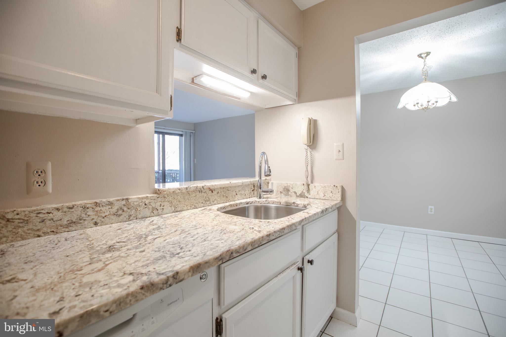 6 Bozarth Court Hamilton, NJ 08690 - Photo 7 of 21 a bathroom with a granite countertop sink and a mirror