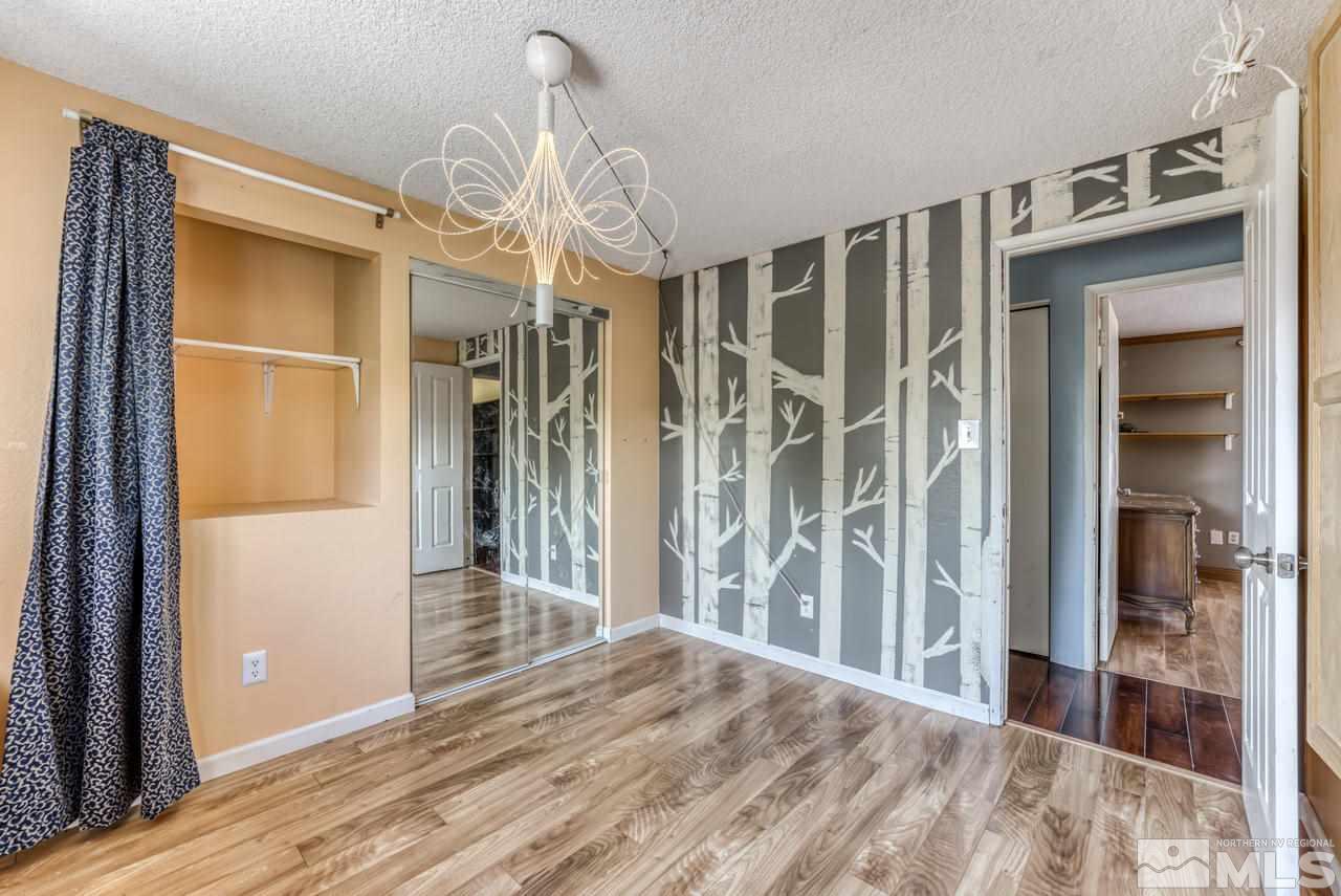 3645 Bryan Street Reno, NV 89503 - Photo 17 of 38 a view of entryway with wooden floor