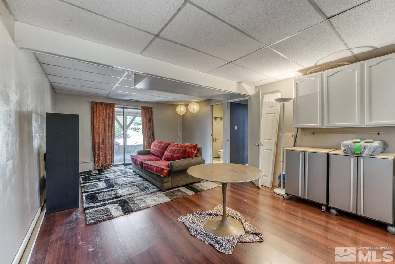 3645 Bryan Street Reno, NV 89503 - Photo 21 of 38 a living room with furniture and a wooden floor