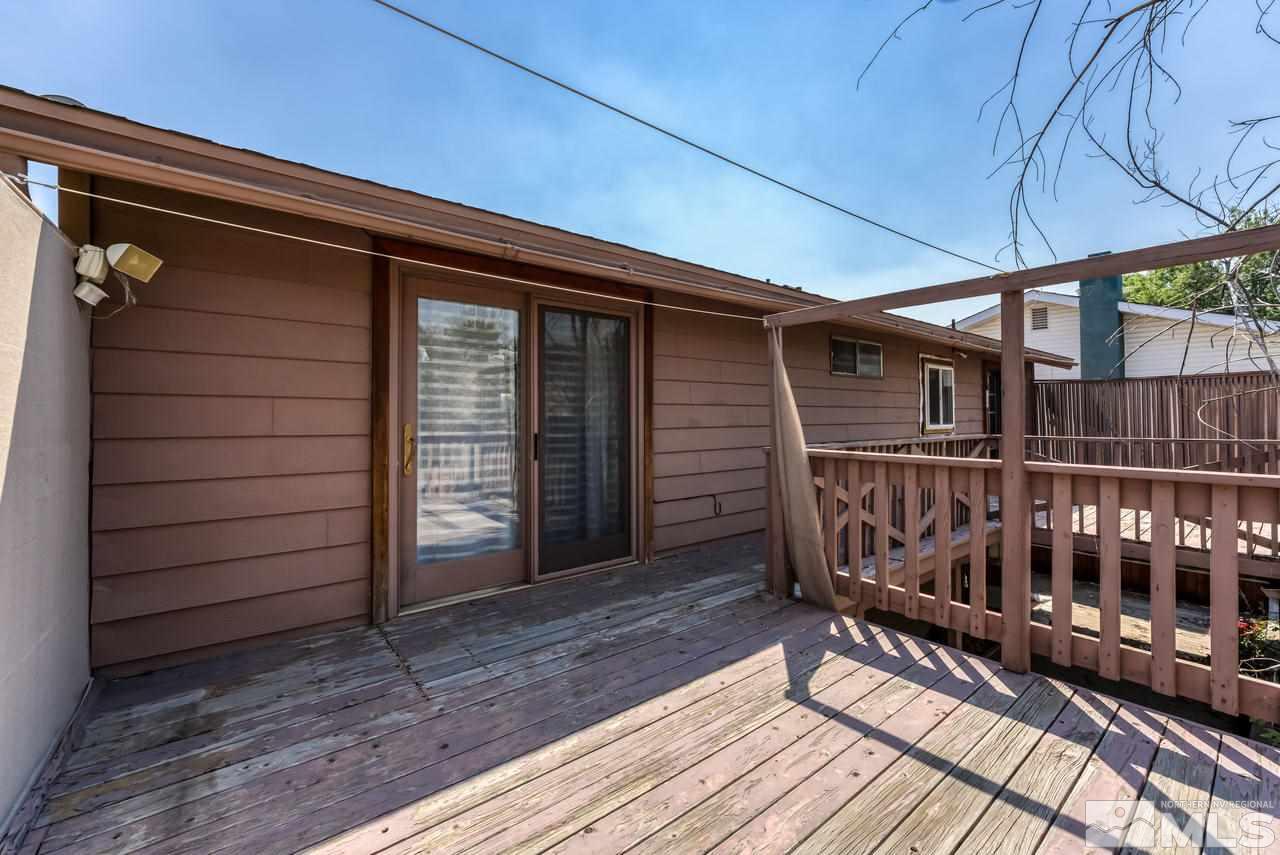 3645 Bryan Street Reno, NV 89503 - Photo 28 of 38 a view of deck with wooden floor and umbrella