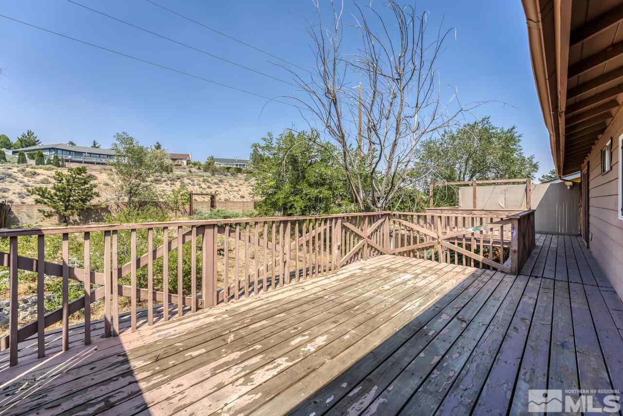 3645 Bryan Street Reno, NV 89503 - Photo 31 of 38 a view of balcony with wooden floor and fence
