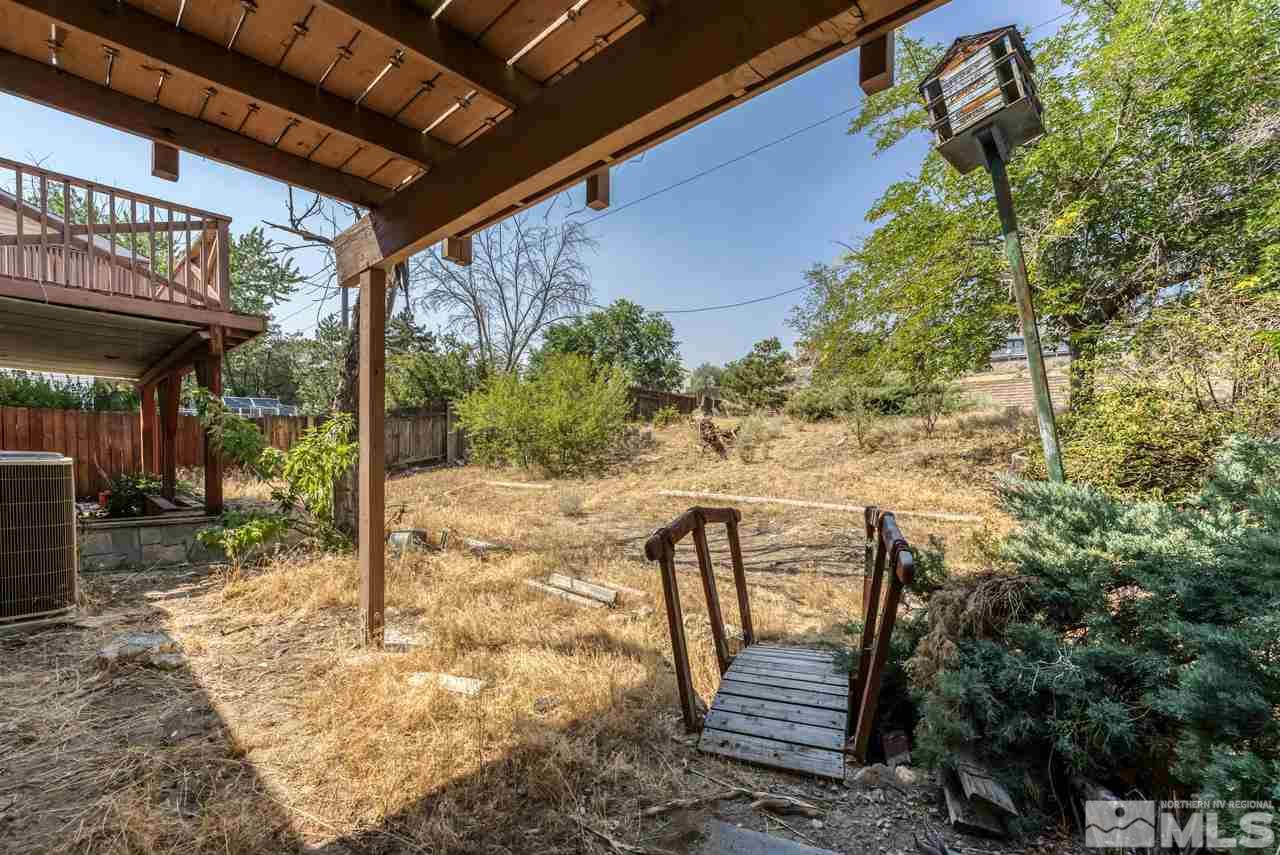 3645 Bryan Street Reno, NV 89503 - Photo 36 of 38 a view of a bench in the patio