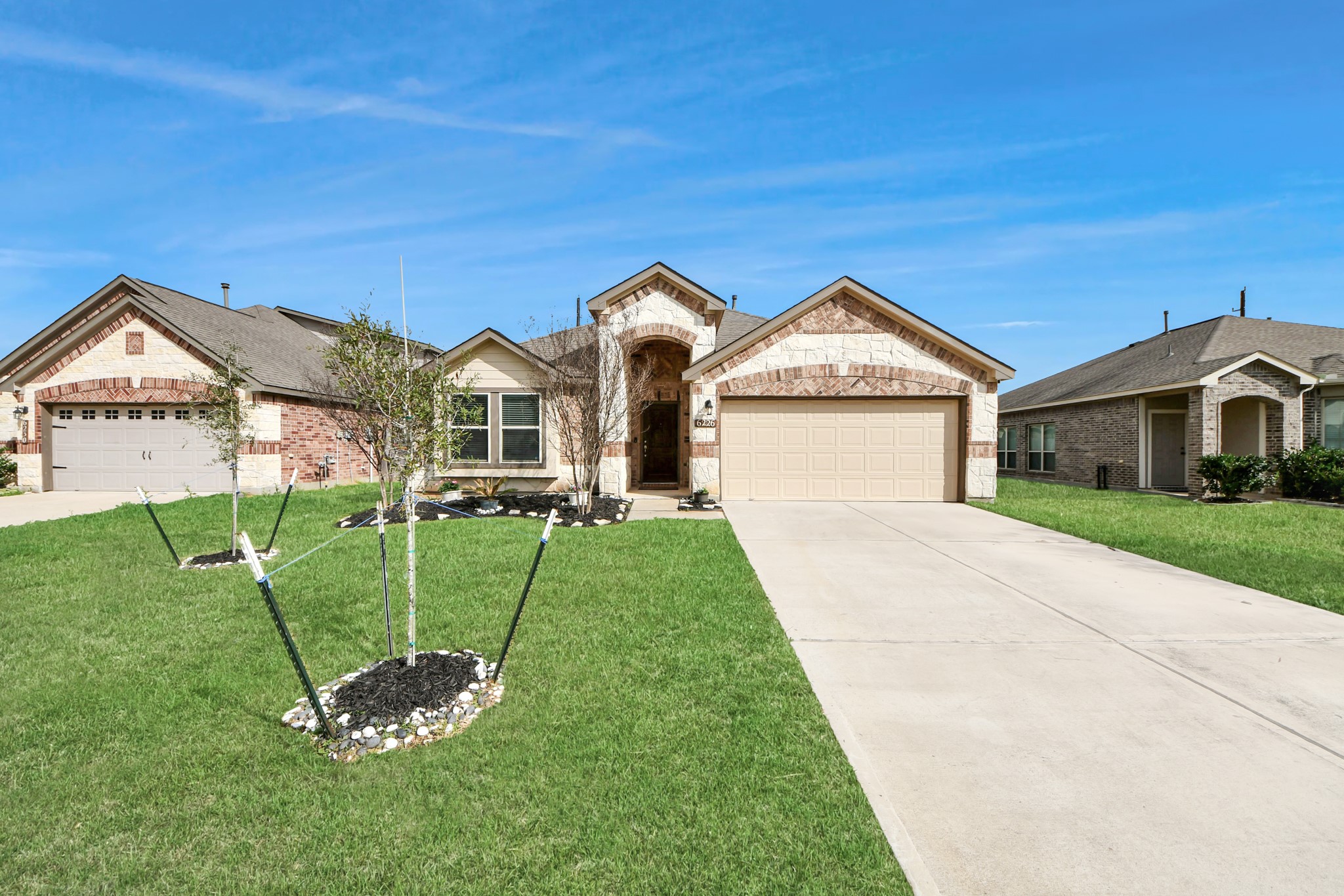 6226 Mason Way Rosenberg, TX 77471 - Photo 30 of 30 a front view of a house with a yard and garage