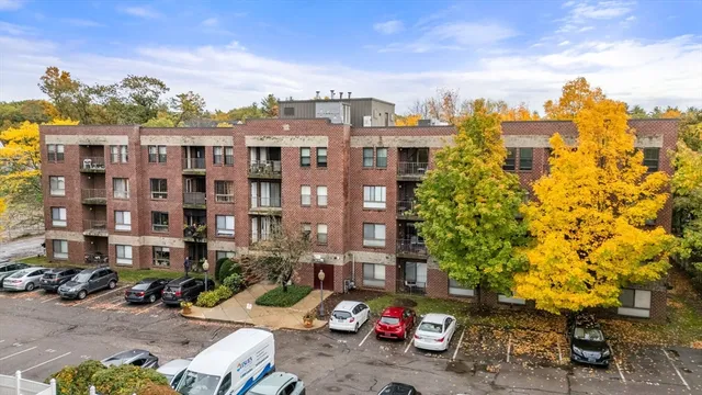a front view of a building with street view