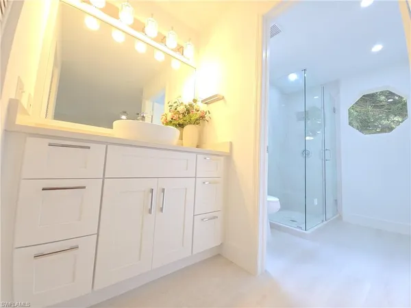 a bathroom with a sink a toilet and a bathtub