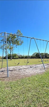 a view of swimming pool with outdoor space and seating area