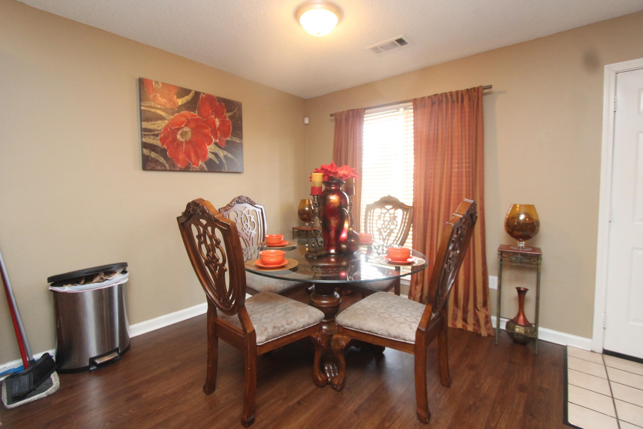 4563 Cedargreen Cove Memphis, TN 38128 - Photo 5 of 12 a dining room with furniture and window