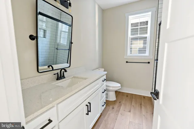 a bathroom with a sink and a toilet