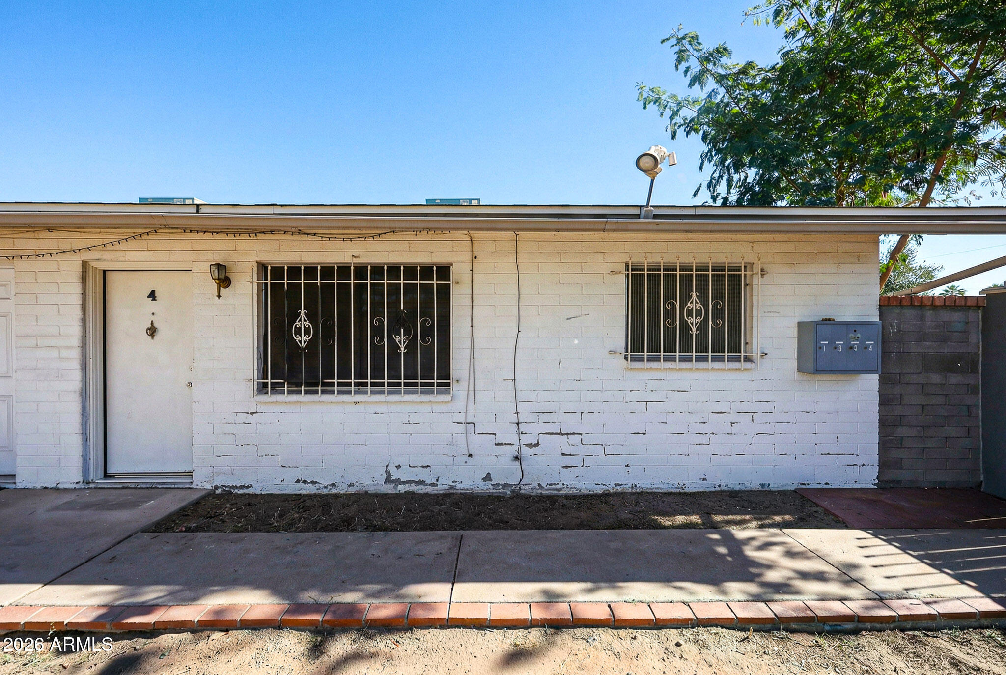 2226 West Heatherbrae Drive, Unit 4 Phoenix, AZ 85015 - Photo 5 of 17 a front view of a house